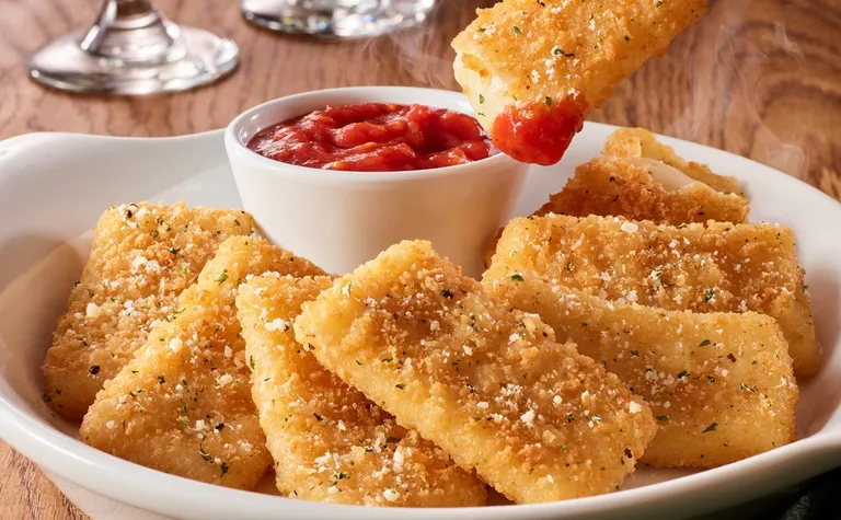 Fried Mozzarella — Crispy, golden-fried mozzarella cheese oozes with flavor. Try this appetizer for lunch or dinner at…