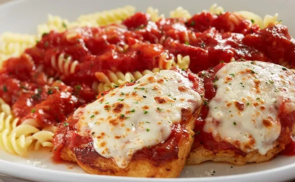 Grilled Chicken Parmigiana — The Gluten Sensitive Grilled Chicken Parmigiana is topped with marinara sauce and Italian…