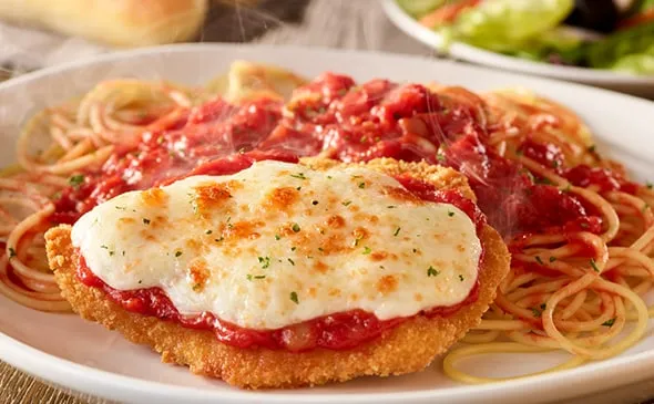 Chicken Parmigiana — A classic with our homemade marinara and a side of spaghetti.