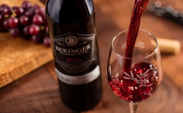 Merlot Beringer — A glass of Beringer Merlot has blueberry, blackberry and plum flavors which are layered with subtle…