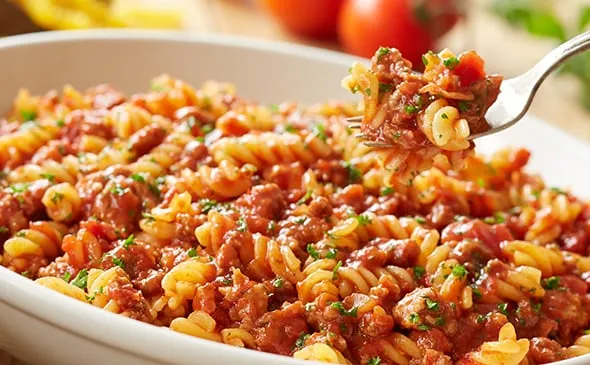 Rotini Pasta with Meat Sauce — Choose a homemade meat sauce tossed with gluten-free rotini. Also available with grilled…