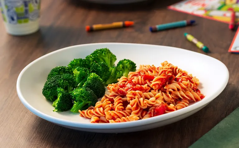Rotini with Marinara (kids) — Kids can enjoy a bowl of gluten-free rotini pasta with marinara sauce, served with grapes on…