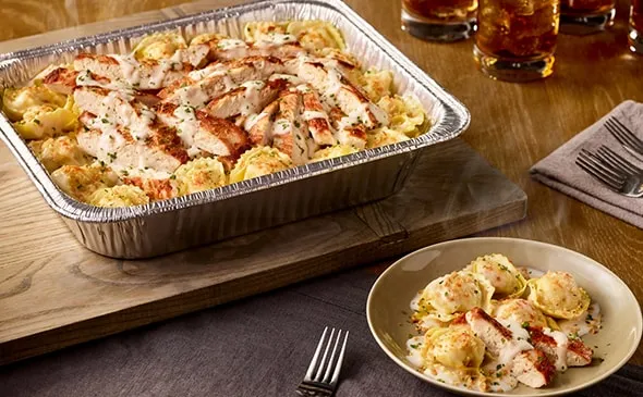 Chicken Tortelloni Alfredo (serves 4 - 6 ) — Include the Asiago Tortelloni Alfredo with Grilled Chicken in your next…
