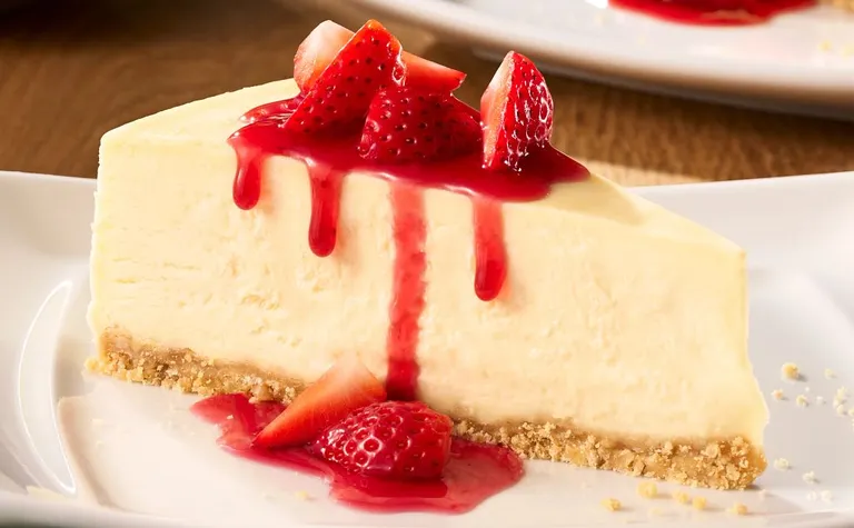 Sicilian Cheesecake with Strawberry Topping — Our rich and creamy ricotta cheesecake features a shortbread cookie crust and…