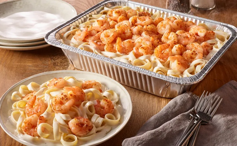 Shrimp Alfredo (Serves 4 - 6) — Includes: A pan of fettuccine with our homemade alfredo sauce and sautéed shrimp.