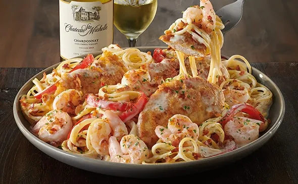 Chicken and Shrimp Carbonara — Sautéed seasoned chicken, shrimp and spaghetti tossed in a creamy sauce with bacon and…