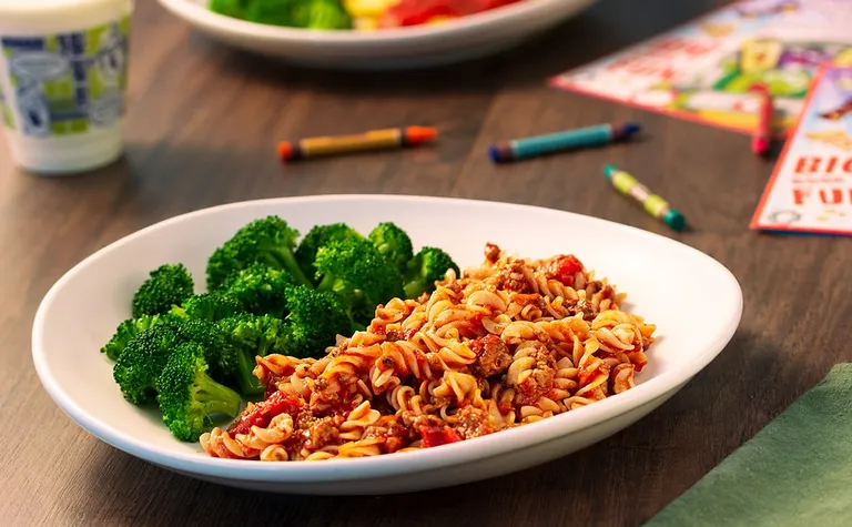 Rotini with Meat Sauce (kids) — Kids can enjoy a bowl of gluten-free rotini pasta with meat sauce, served with grapes on…