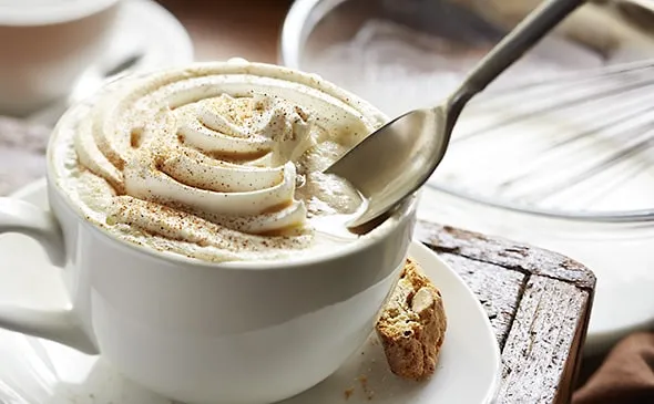 Cappuccino — Lavazza Espresso and steamed milk, topped with whipped cream and a sprinkle of cinnamon.