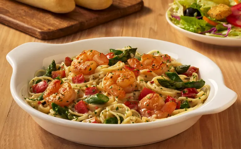 Shrimp Scampi — Available weekdays, 11am-3pm. Have a lunch-sized portion of the Shrimp Scampi at Olive Garden which is…