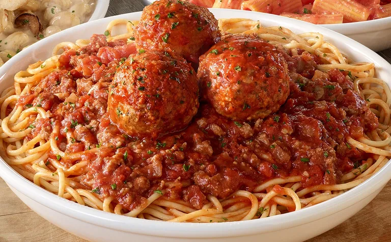 Spaghetti & Meatballs — Spaghetti and meatballs with your choice of marinara or meat sauce.